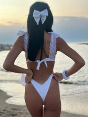 Bikini a triangolo con fiocchi in pizzo